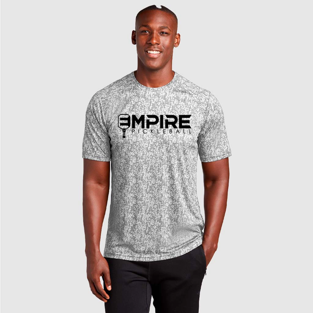 Men’s Empire Pickleball white Dri Fit shirt with black logo and digital camo pattern.