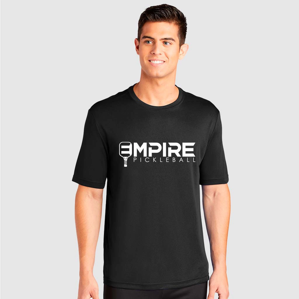 Man wearing Empire Pickleball black athletic performance shirt