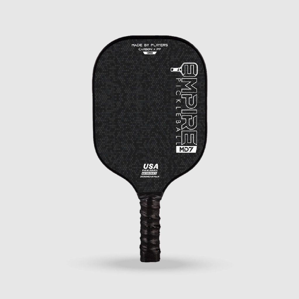 Empire Pickleball MD7 carbon fiber paddle with textured black surface and USA Pickleball approval.